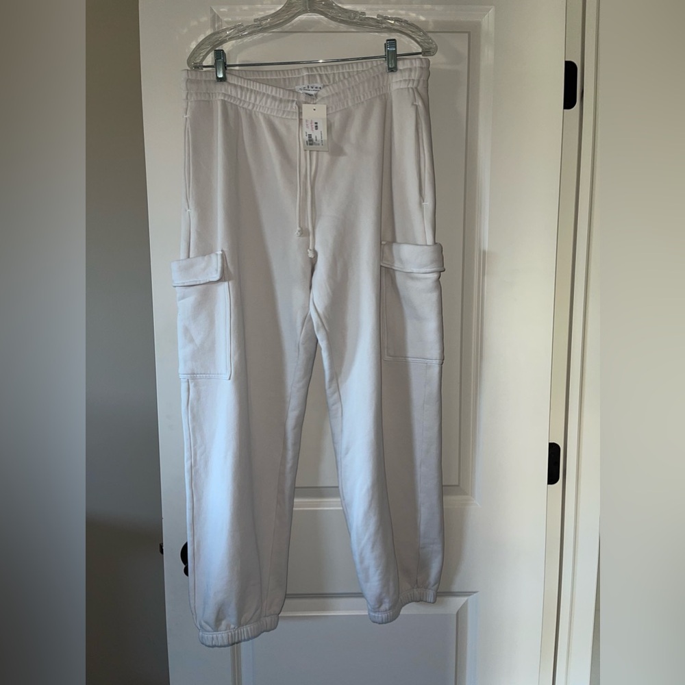 New with tags.  Velvet by Graham cargo sweats.  Off white/Taupe